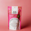 Pink package of Bush Berry Echinacea & Elderflower on a pink background